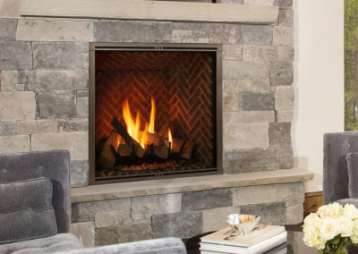 Stone fireplace with herringbone brick detail
