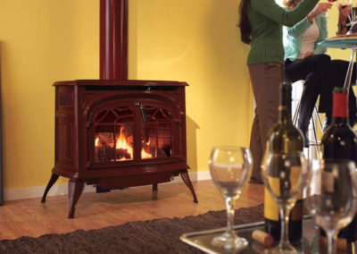 Dark gas stove on a hardwood floor