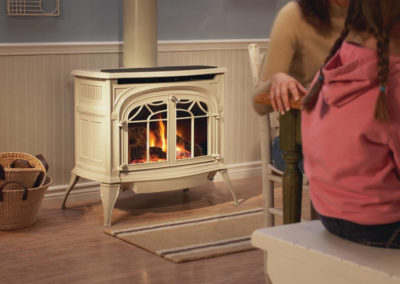 White metal wood burning stove in a dining room