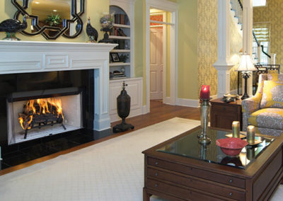 Black and white fireplace under a white mantel