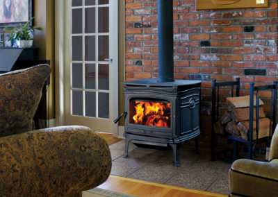 Wood stove burning in a home
