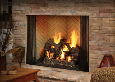 Wood burning fireplace in a stone hearth