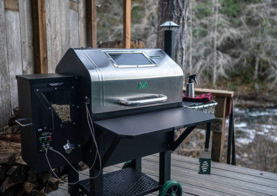 Grill on a deck out by a river
