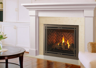 Marble fireplace with herringbone brick detail