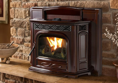 Brown metal stone insert inside a brick hearth