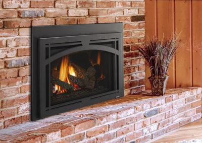 Brick hearth with a black fireplace insert