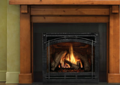 Wooden mantel around a fireplace
