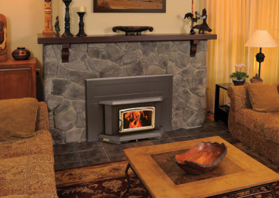 Stone hearth with a fire burning in the fireplace